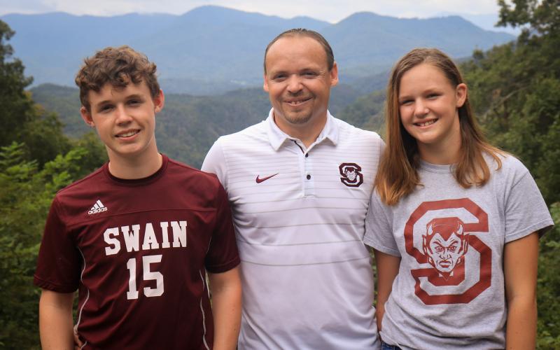 From left is Zachary, Scott and Karena Cline. 