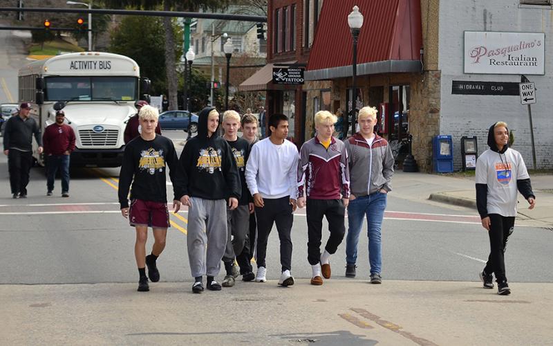 The Swain County Maroon Devils wrestling team had a victory walk through town after returning from the state championships.