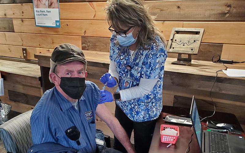 Mark Hyatt, owner and operator of Mark’s Garage in Bryson City, received a vaccine earlier this month from the Swain County Health Department.