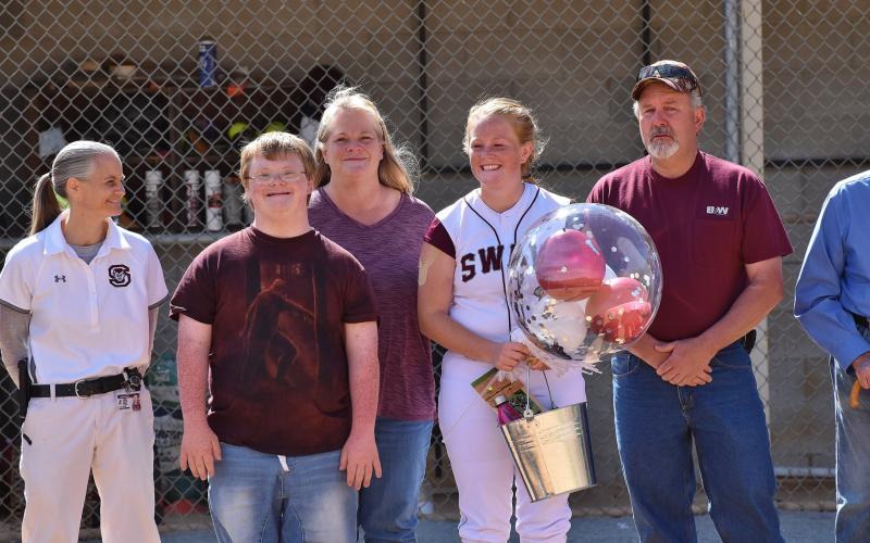 Lady Devil Senior Stacey Griggs is pictured with family on Senior Night