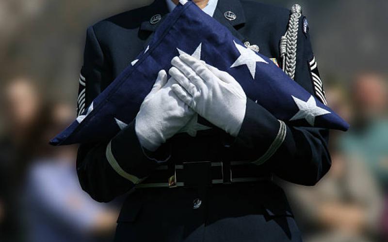 Folded flag at veteran funeral
