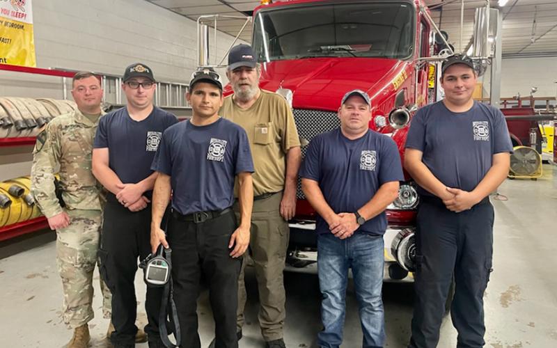 (From left) Newly elected Lt. Kevin Bryson, Full-time firefighter Phil Carson, Lt. Darius Blanton, Cpt. Jeff Gasaway, Cpt. Jeramy Shuler, and Cpt. Tyler Taylor of BC Fire Department stand in front of recently delivered new fire truck.