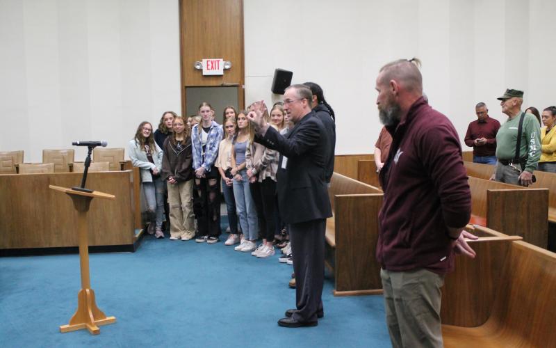 Superintendent Mark Sale introduces a host of Swain County High runners and wrestlers, all of whom have recently done well at championship events, before the April 4 County Commission workshop.