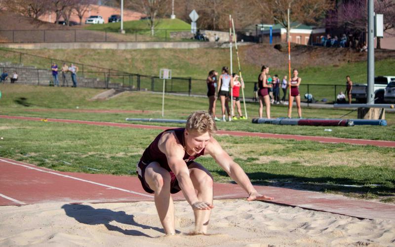 Josh Collins competes in triple jump at the WCU meet.