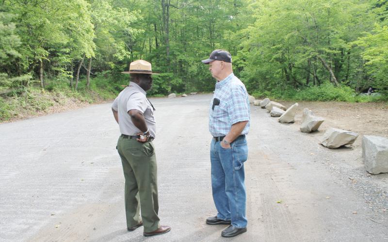 Superintendent Cassius Cash (from left) and Coach Bob Marr at the new parking area at Deep Creek, will open over Memorial Day weekend.