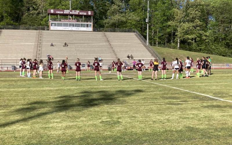 The Swain County High School Lady Devils varsity soccer team recognized May as Mental Health Month during their home game on Monday, May 8. Before the game, they gathered in a circle and prayed together to raise awareness for mental health issues.