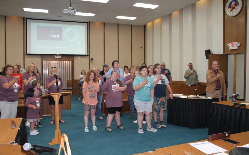 The area’s Special Olympics team helped lead Monday night’s school board meeting in the Pledge of Allegiance.
