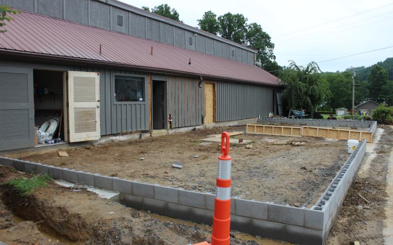 Construction takes place at the county pool where new buildings are being built including restrooms and meeting rooms.